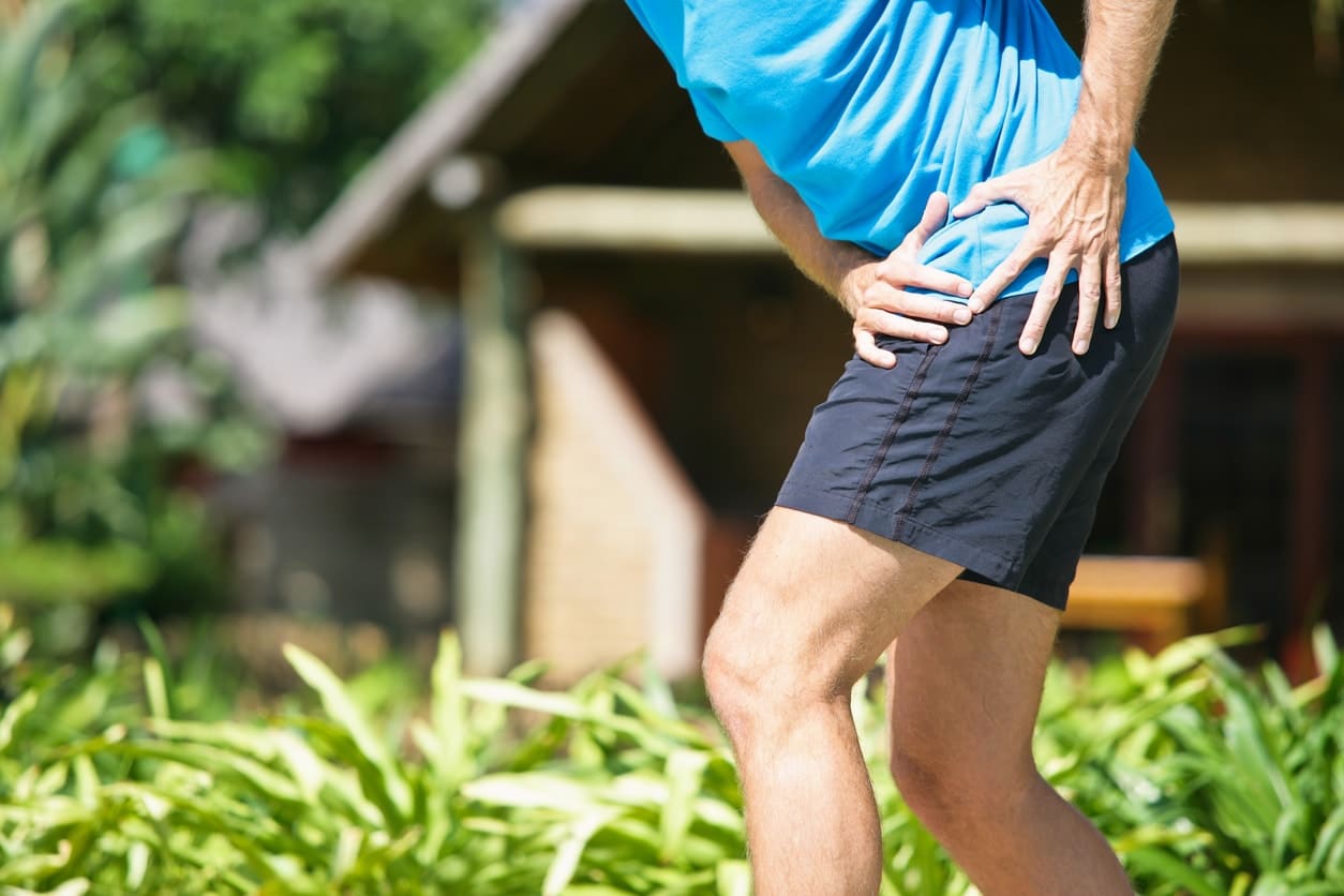 man suffering from hip pain