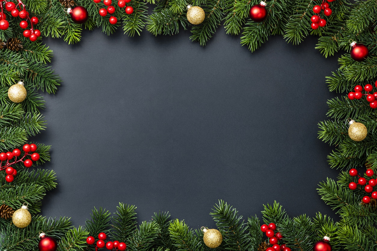 Christmas decoration frame with copy space on black background